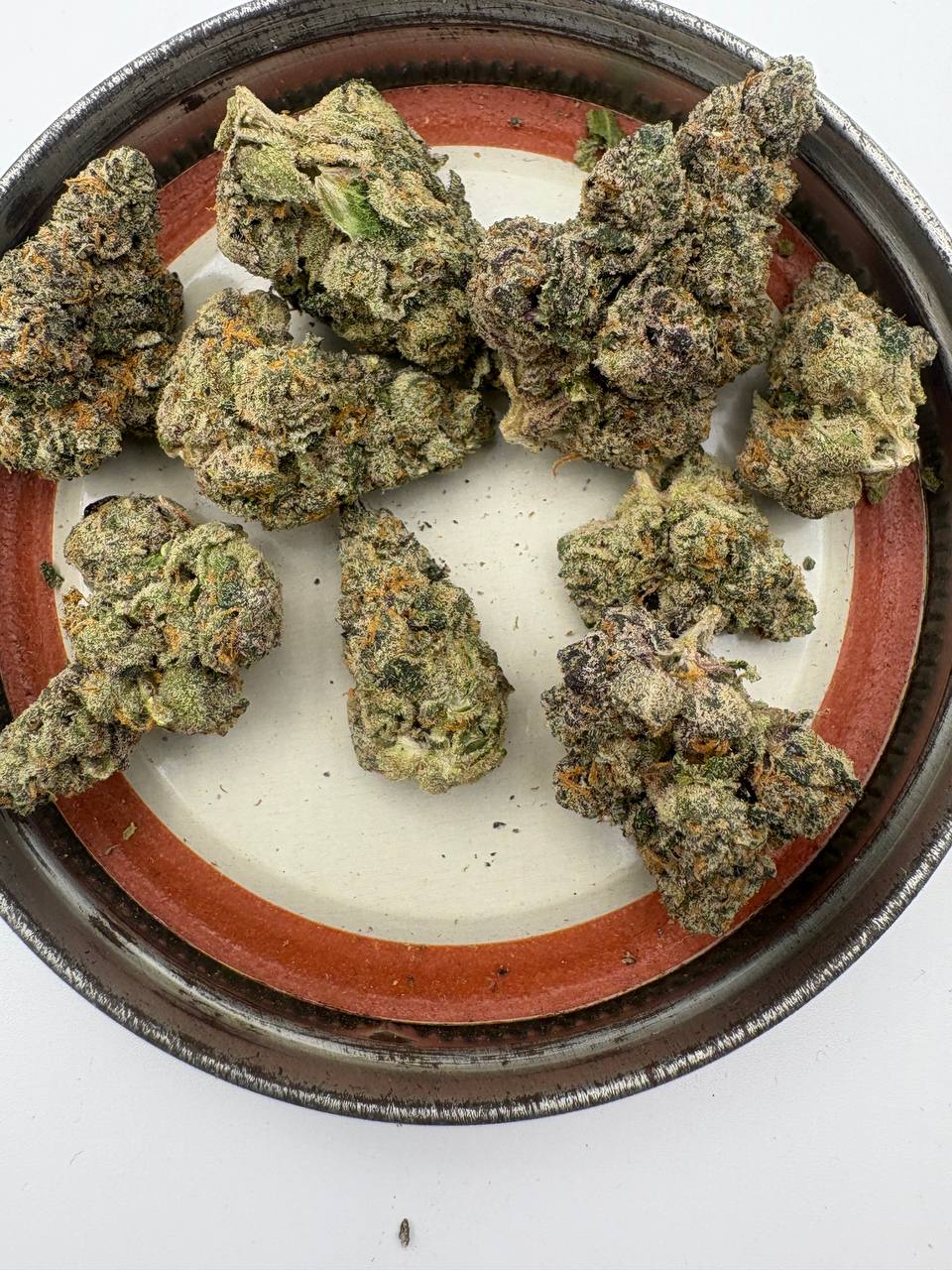 Premium exotics . Cherry noir is a treat, head banger is great daytime weed, haven’t smoked much biscotti yet but it’s quite loud too and I did get a negative review on the 23. Was told it wasn’t smoking and had black ash. When I smoked it i enjoyed it tho but I’ll have to give it another go after hearing that . All of these are less harsh than the exotics by the second half/end of the j Medium 3