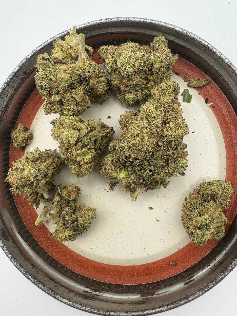 Premium exotics . Cherry noir is a treat, head banger is great daytime weed, haven’t smoked much biscotti yet but it’s quite loud too and I did get a negative review on the 23. Was told it wasn’t smoking and had black ash. When I smoked it i enjoyed it tho but I’ll have to give it another go after hearing that . All of these are less harsh than the exotics by the second half/end of the j Medium 5